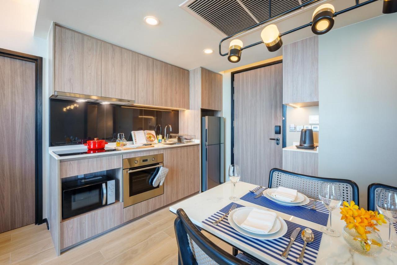 Somerset Pattaya Exterior foto A kitchen in a serviced apartment in Singapore